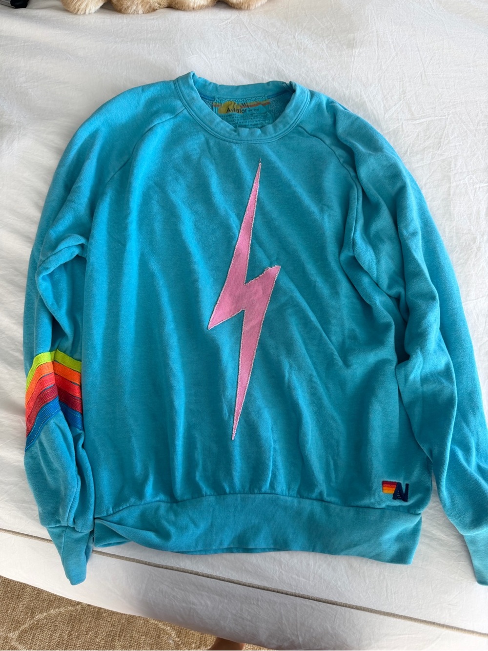 Aviator Nation Turquoise Crewneck with Pink Lightning and Rainbow Sleeve